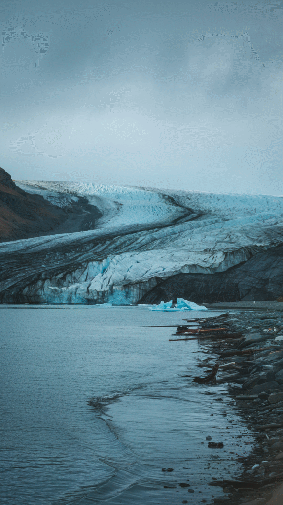 a-photo-of-a-glacier-melting-into-the-se_ua41ZcdnRaeOh8uShkrRGg_81ladTH3RcCmXbwuA52GNw